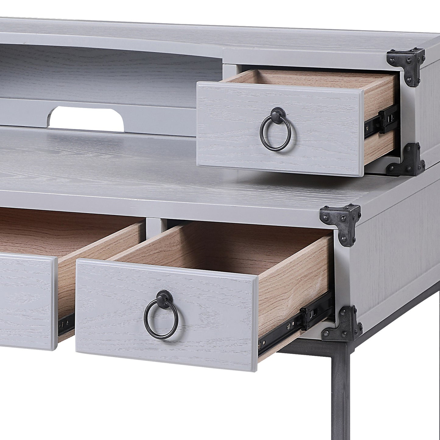 Gray wood desk with open drawers and ring pulls showcasing modern design elements