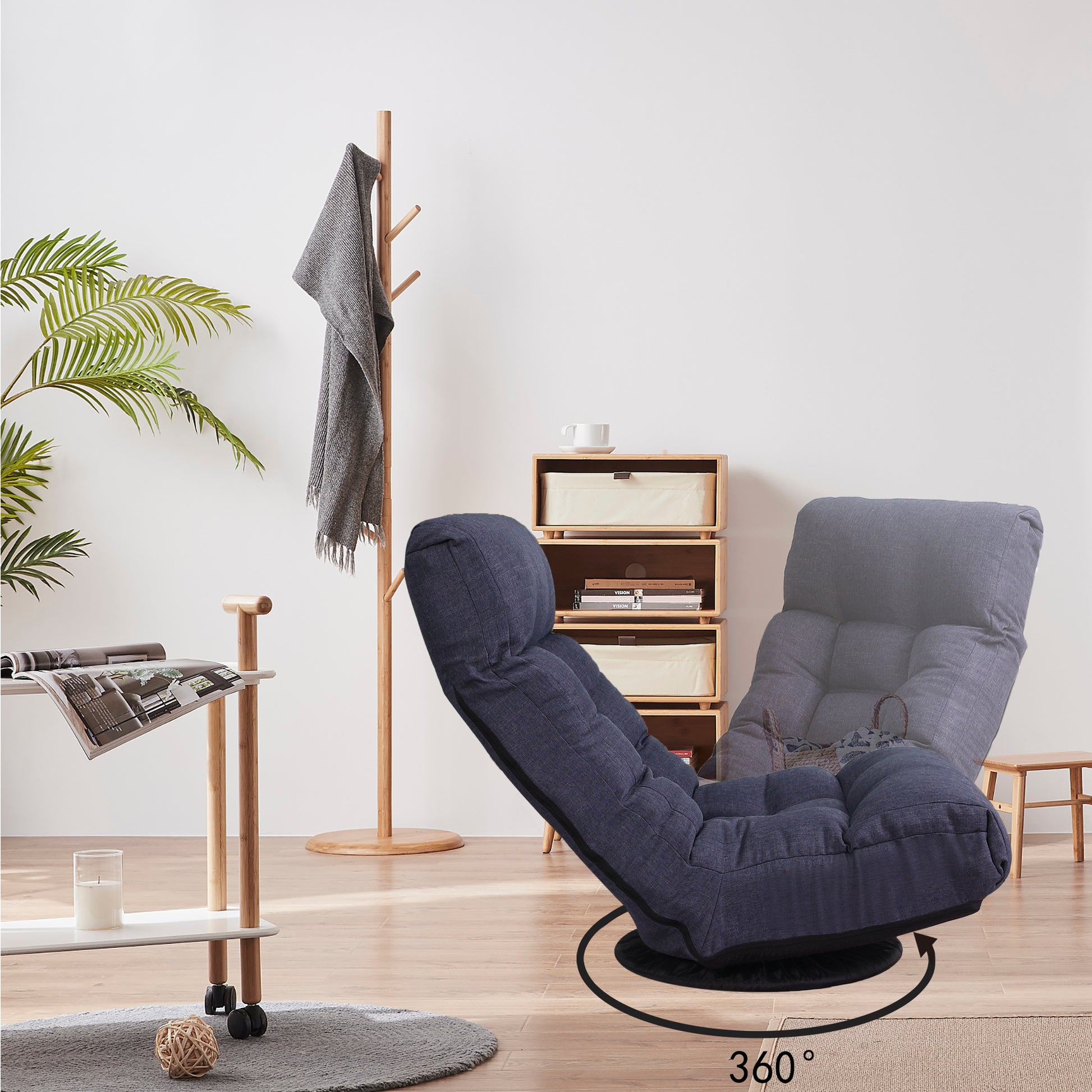 Dark blue upholstered floor chair with adjustable backrest and degree swivel base
