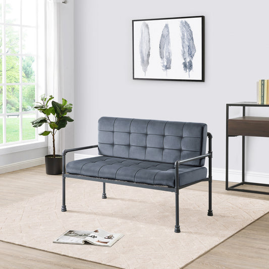 Tufted grey velvet loveseat with black metal frame ideal for a modern living room