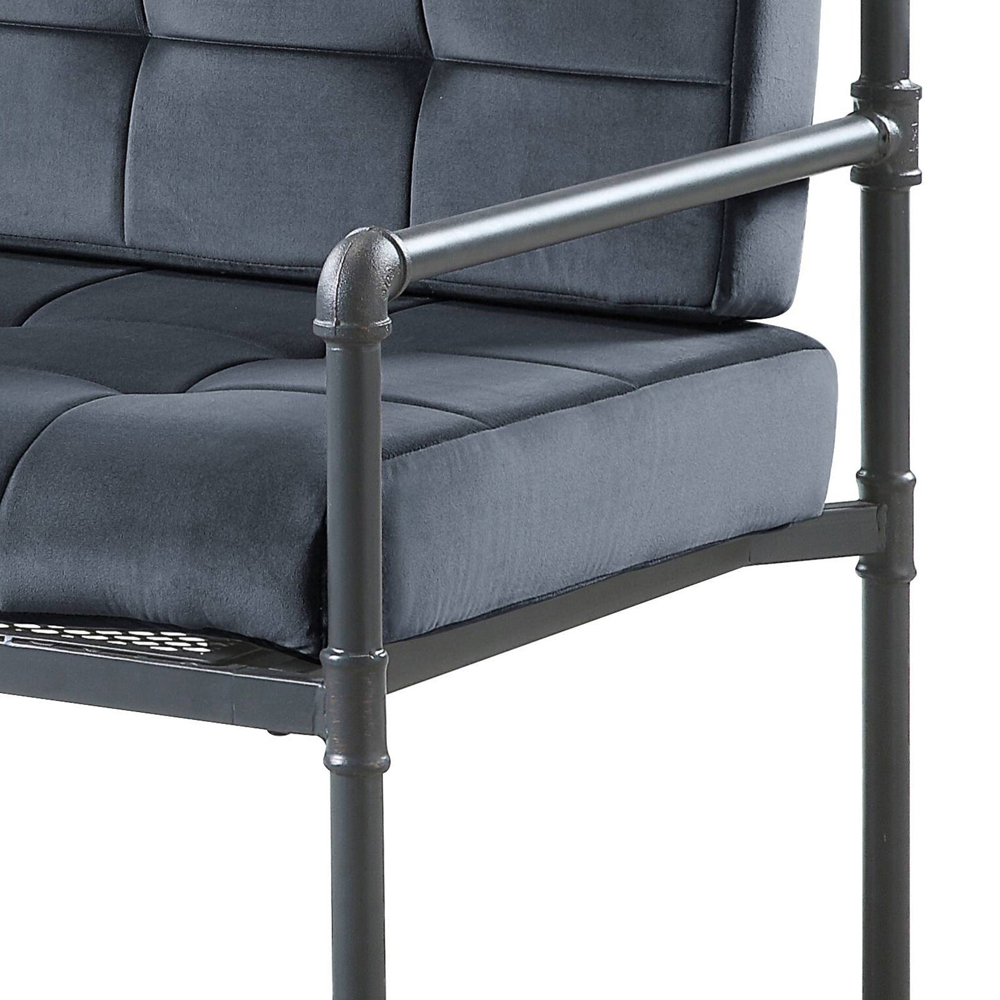 Dark grey tufted velvet sofa armrest and pipe frame