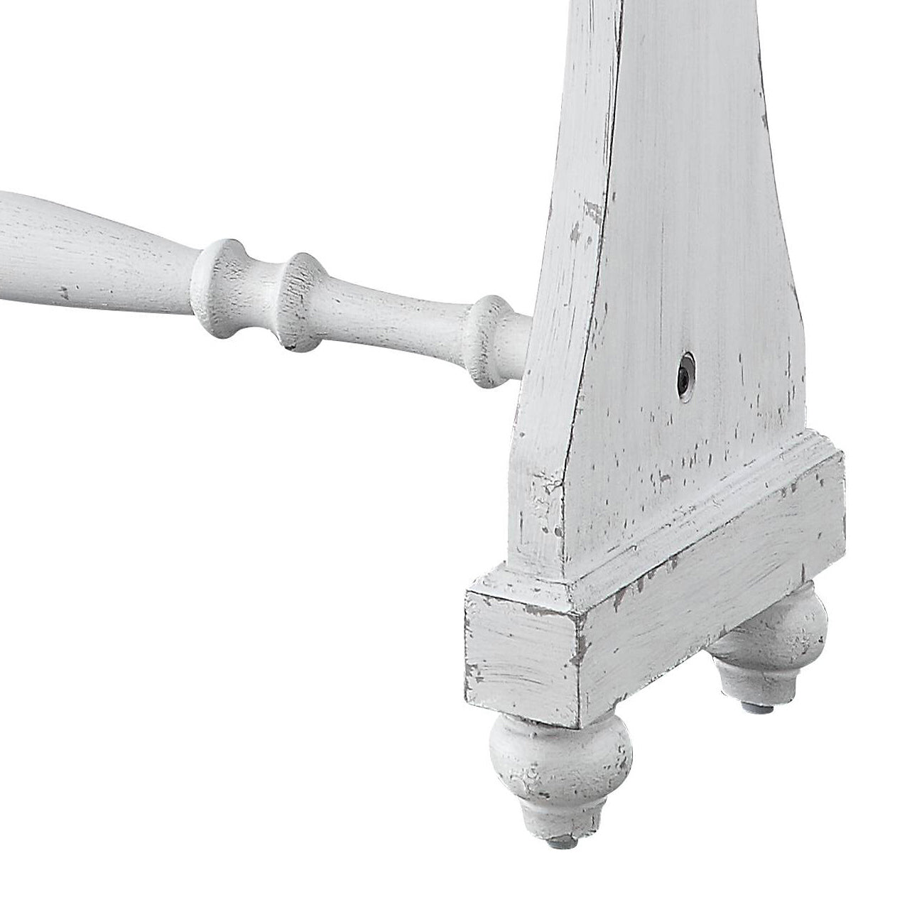 Distressed white wooden table leg with turned spindle detail