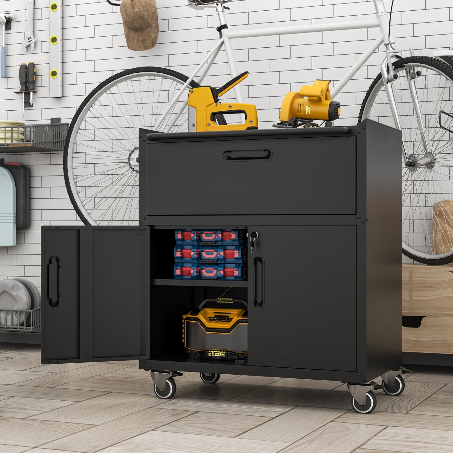 Black rolling tool chest with three organizer boxes and a battery pack inside