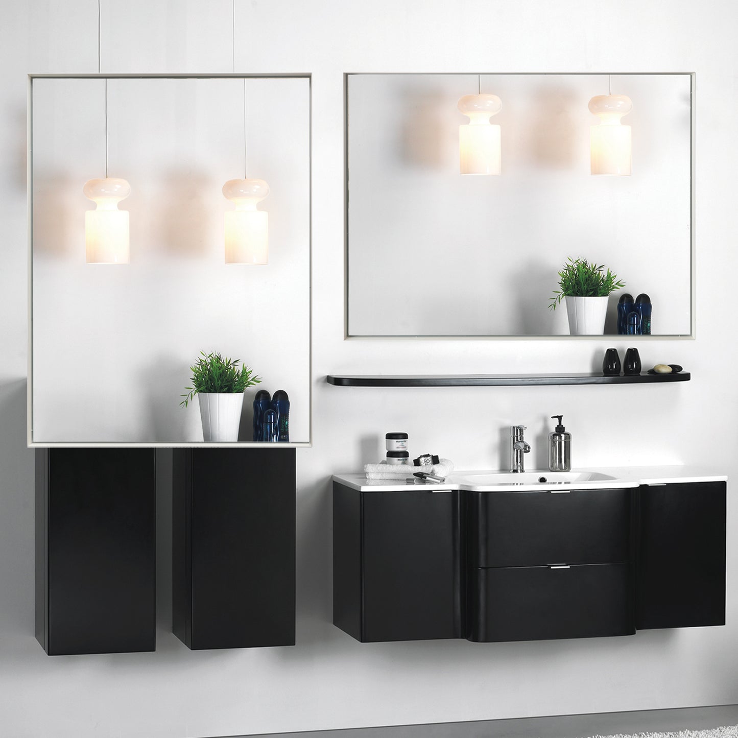 Modern matte black bathroom vanity with integrated sink and chrome faucet