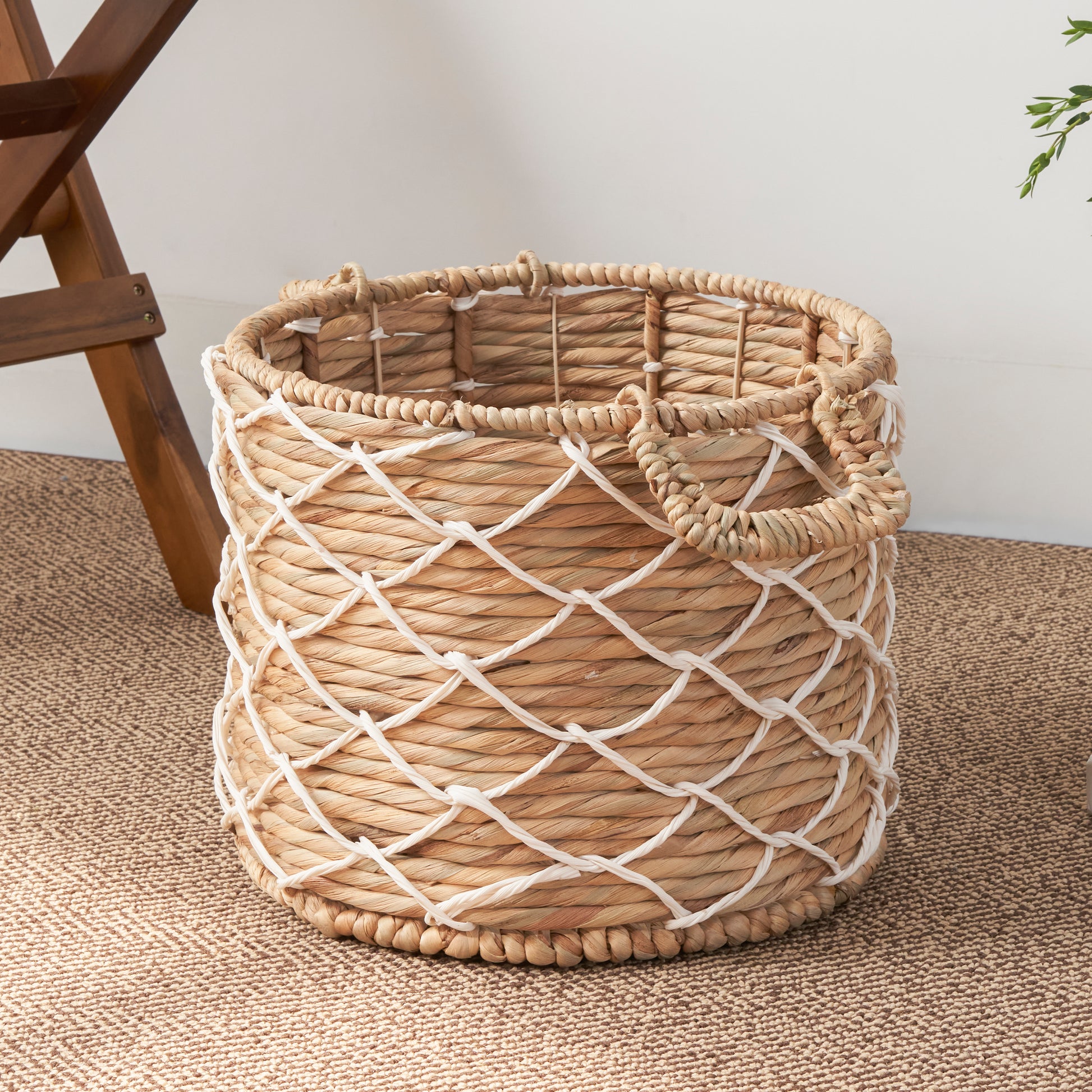 Natural woven hyacinth basket with white rope detail