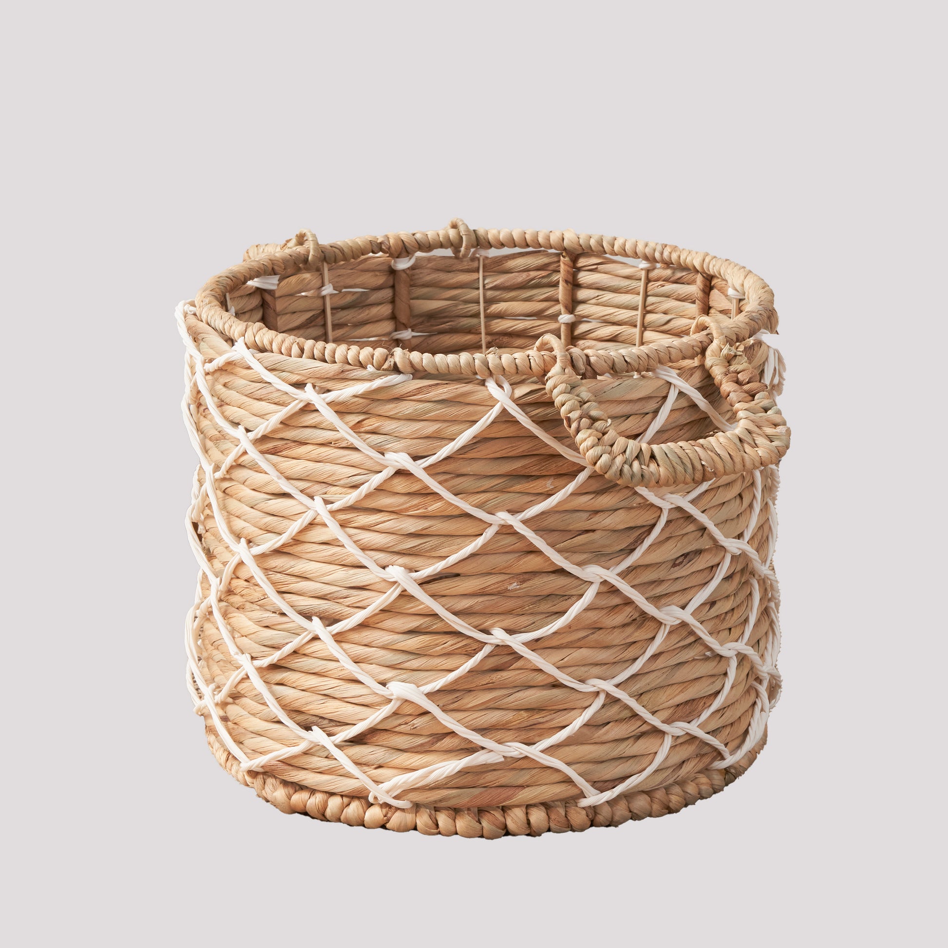 Natural woven basket with white rope detailing