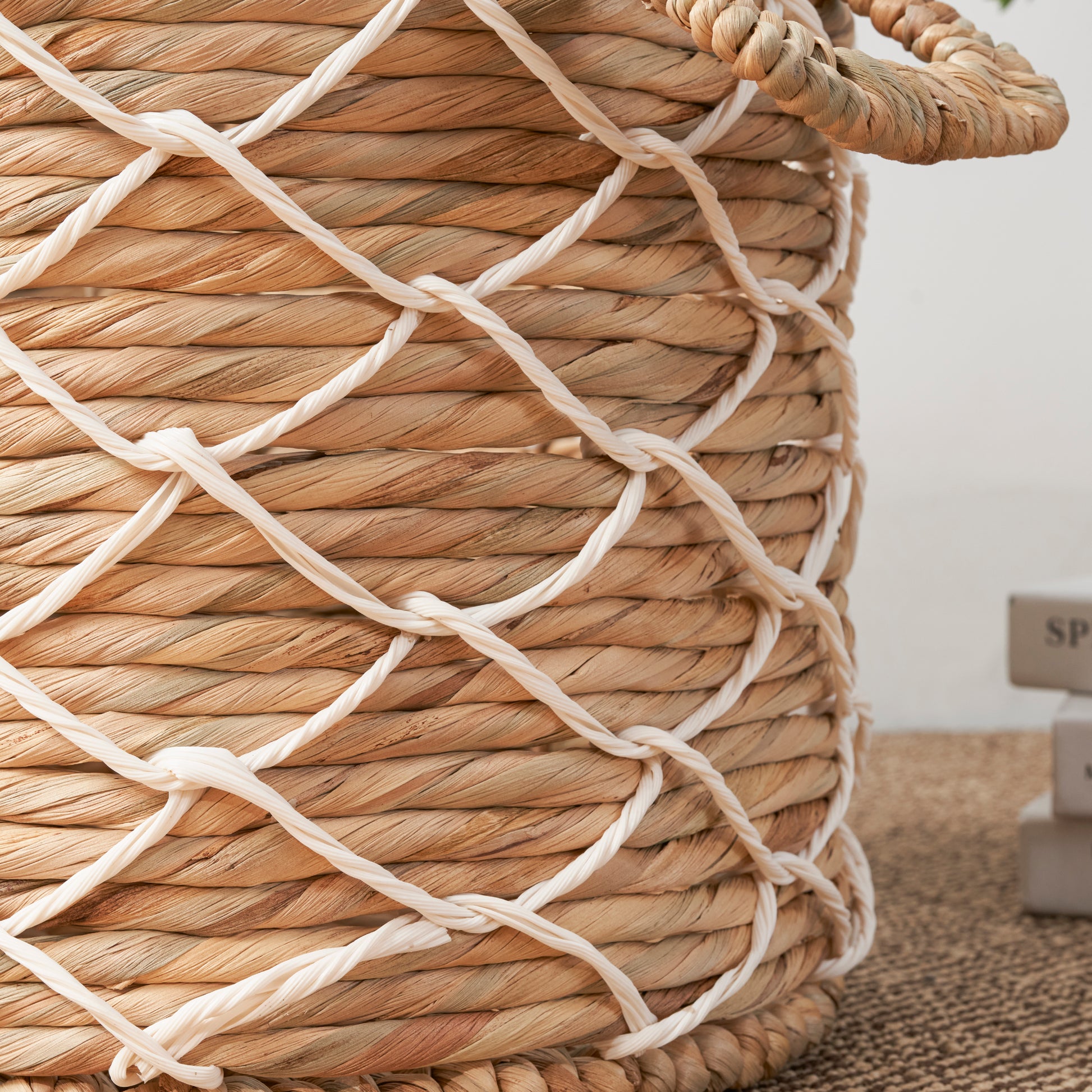 Natural woven storage basket with white rope accents