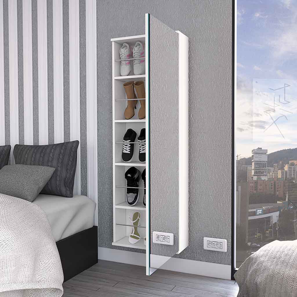 White tall shoe cabinet with shelves displaying sneakers boots and sandals