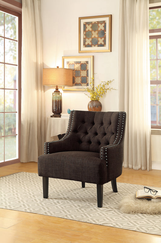 Dark brown tufted accent chair with silver nailhead trim and wooden legs