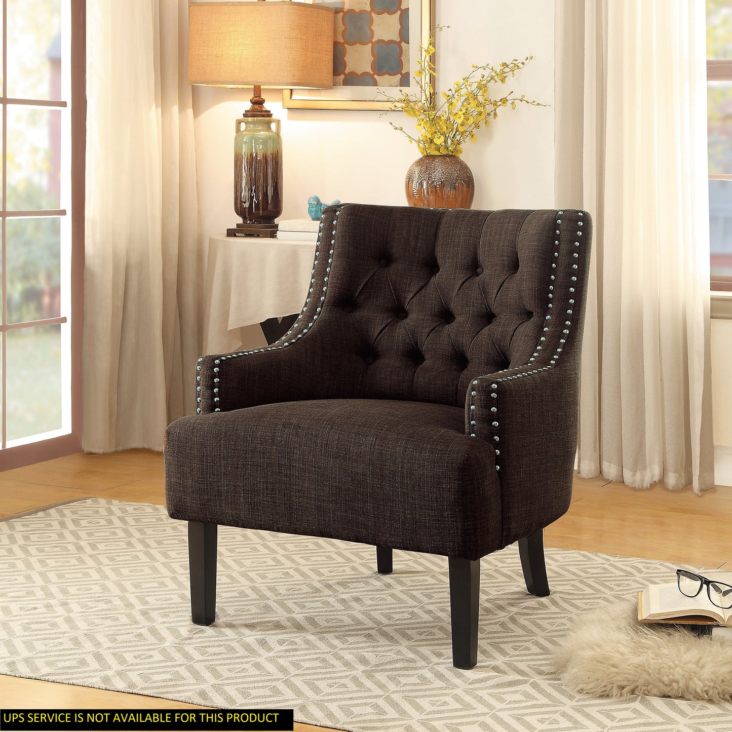 Tufted accent chair in dark brown linen fabric with silver nailhead trim