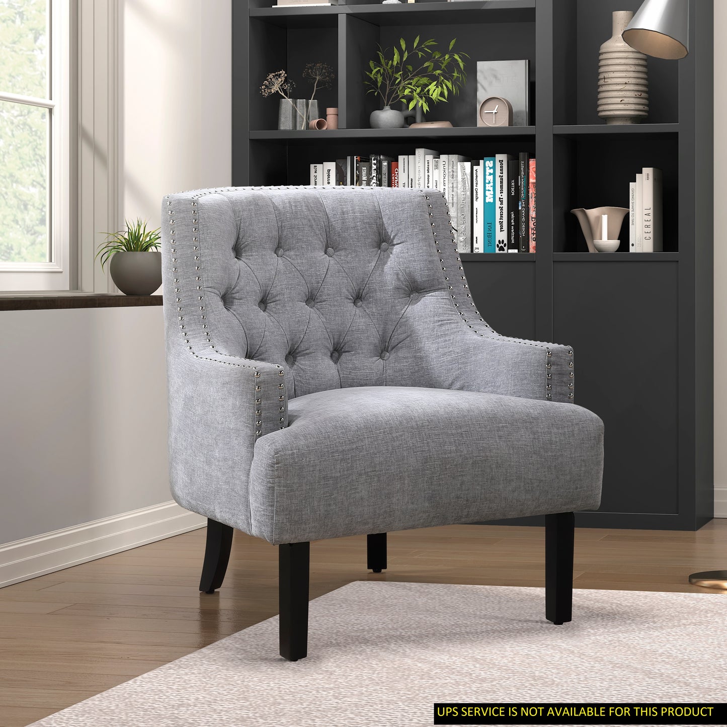 Tufted gray accent chair with nailhead trim dark wooden legs ideal for living rooms