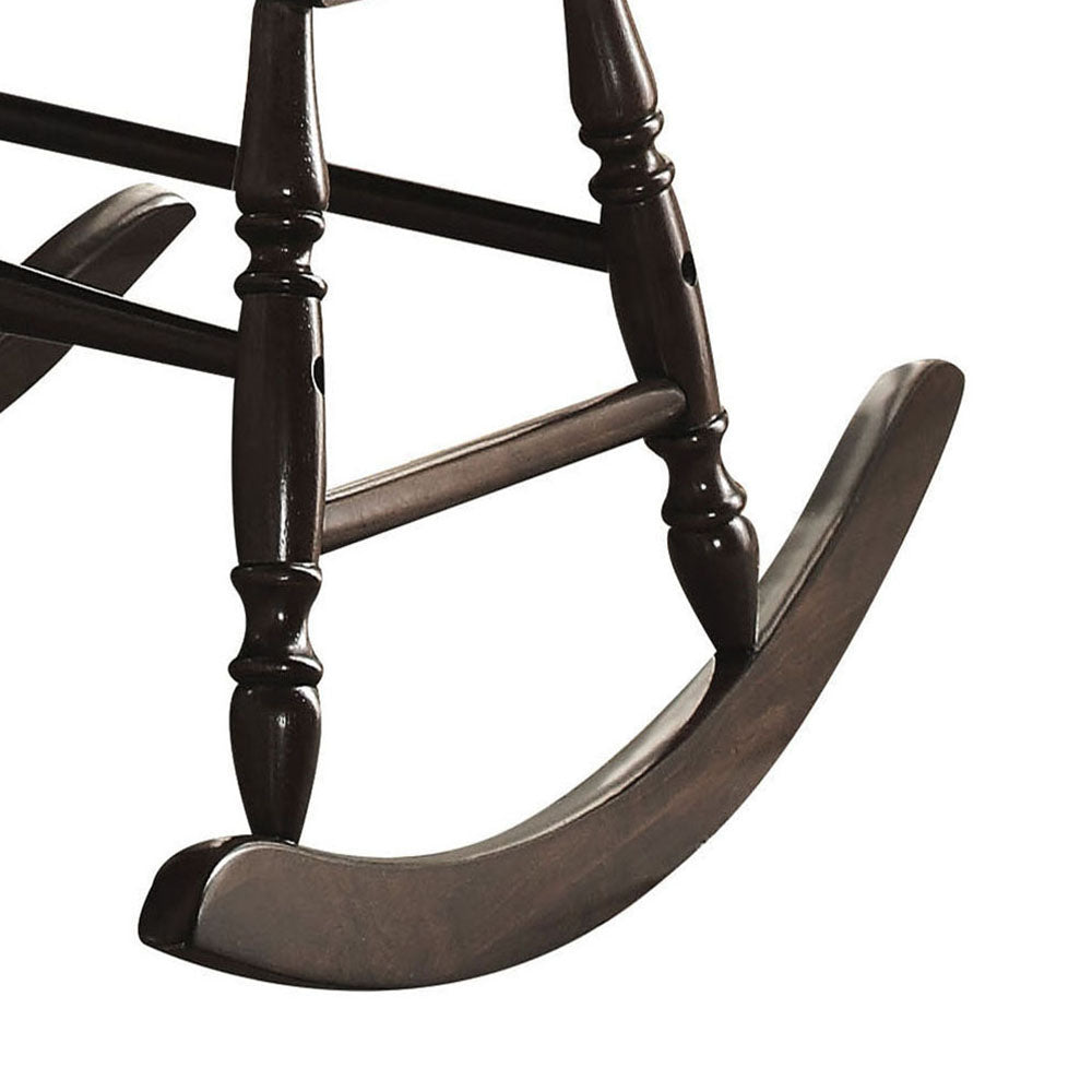 Dark wood rocking chair base with ornate carved legs and curved rockers