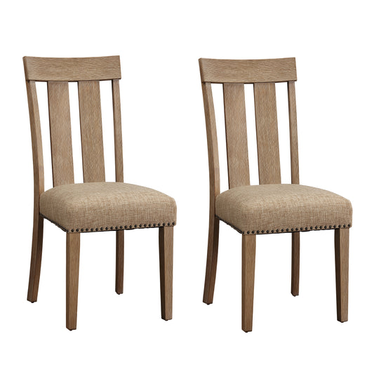 Two rustic oak dining chairs with upholstered beige seats and nailhead trim