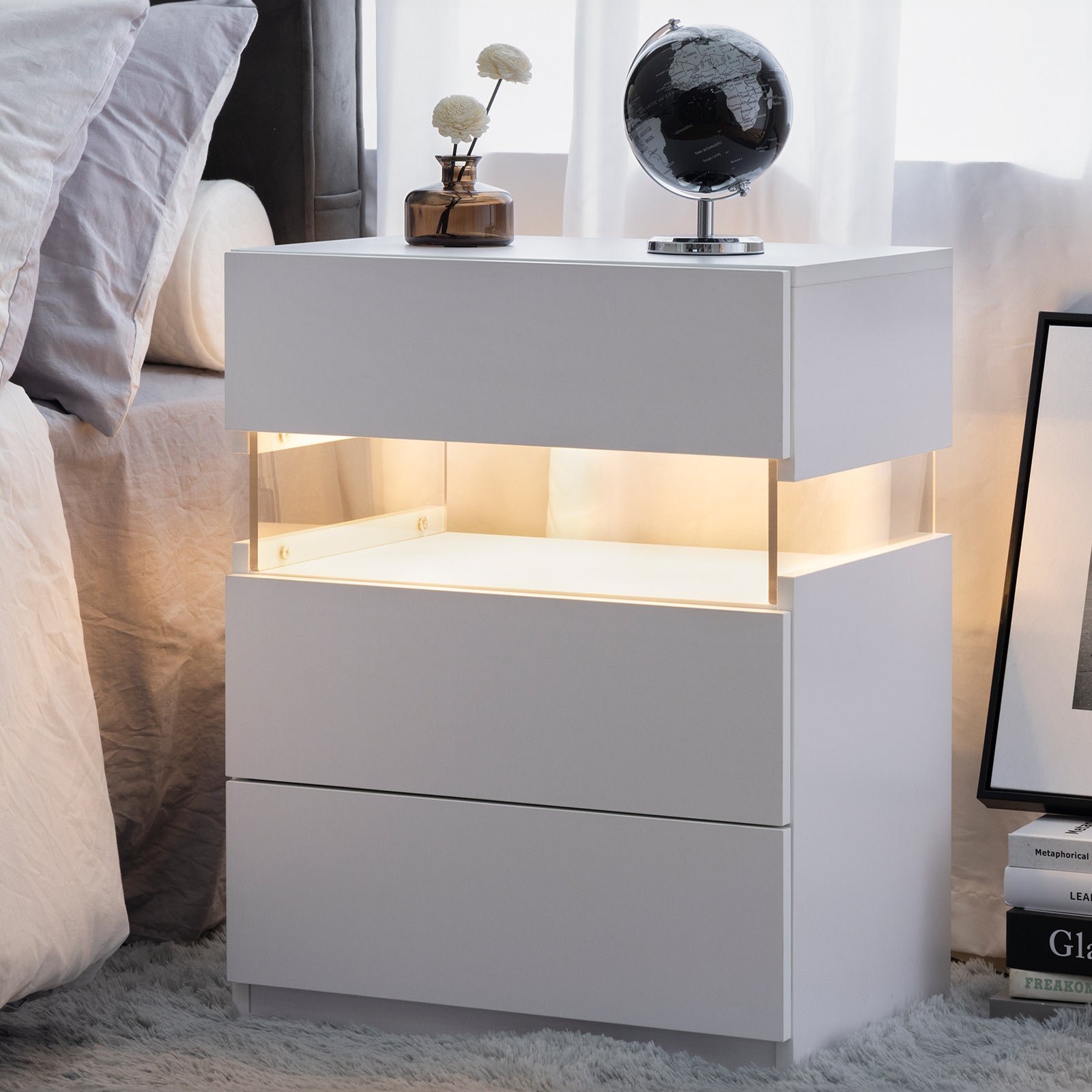 Modern white bedside table with LED lighting