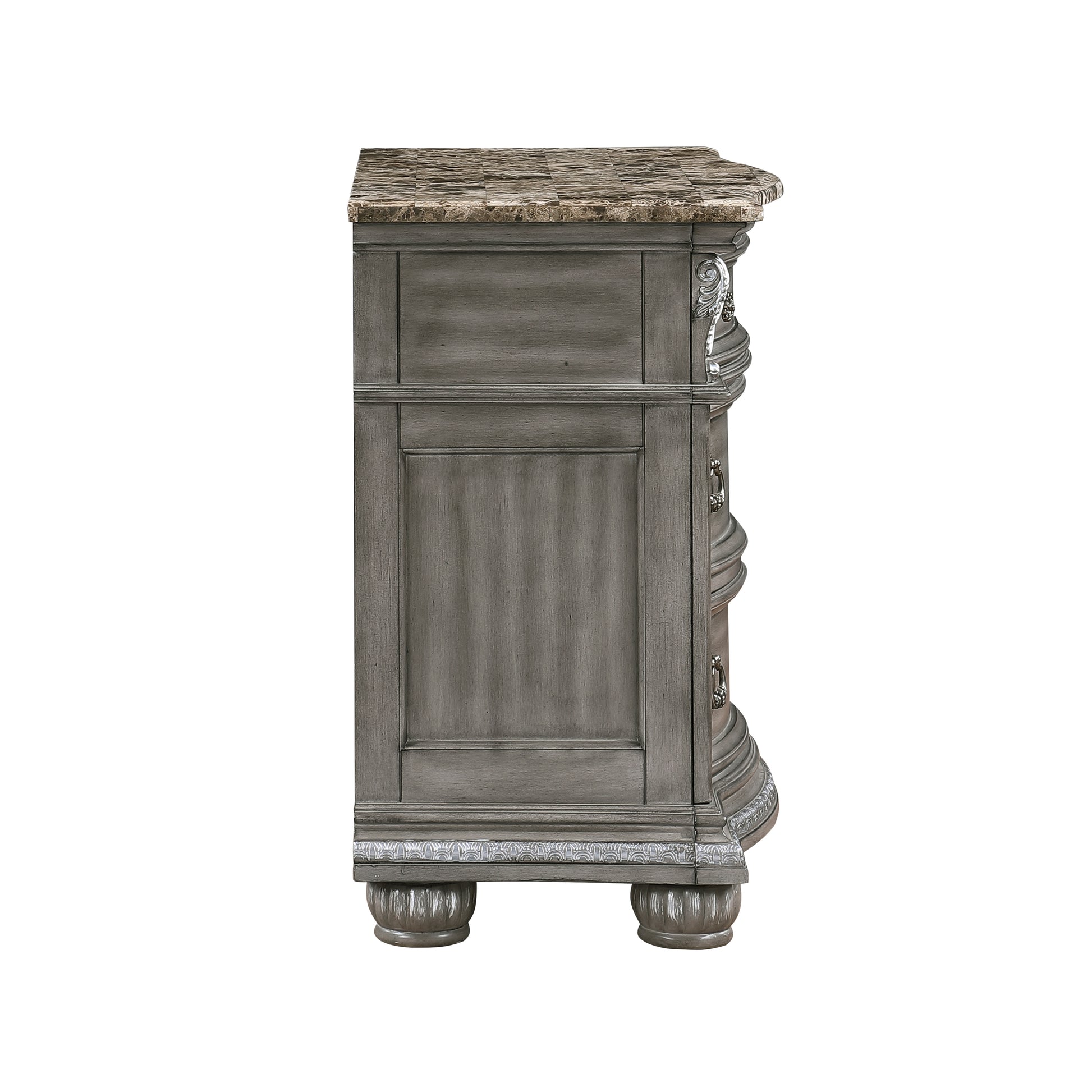 Gray carved wood dresser with a marble top and ornate hardware