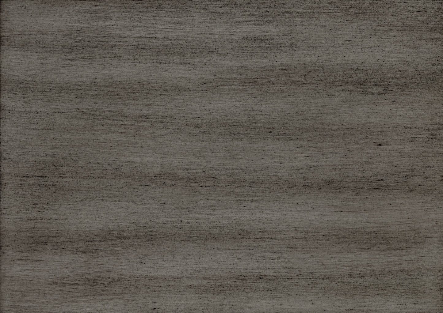 A closeup of a dark grey textured wood surface with visible grain