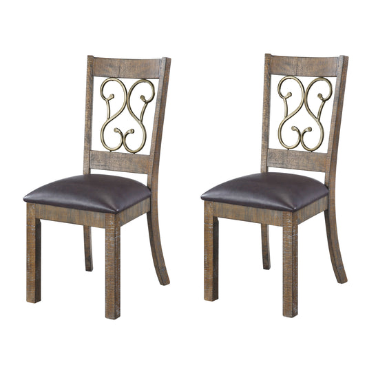 Two distressed wood dining chairs with dark brown faux leather seats and ornate gold scroll back accents