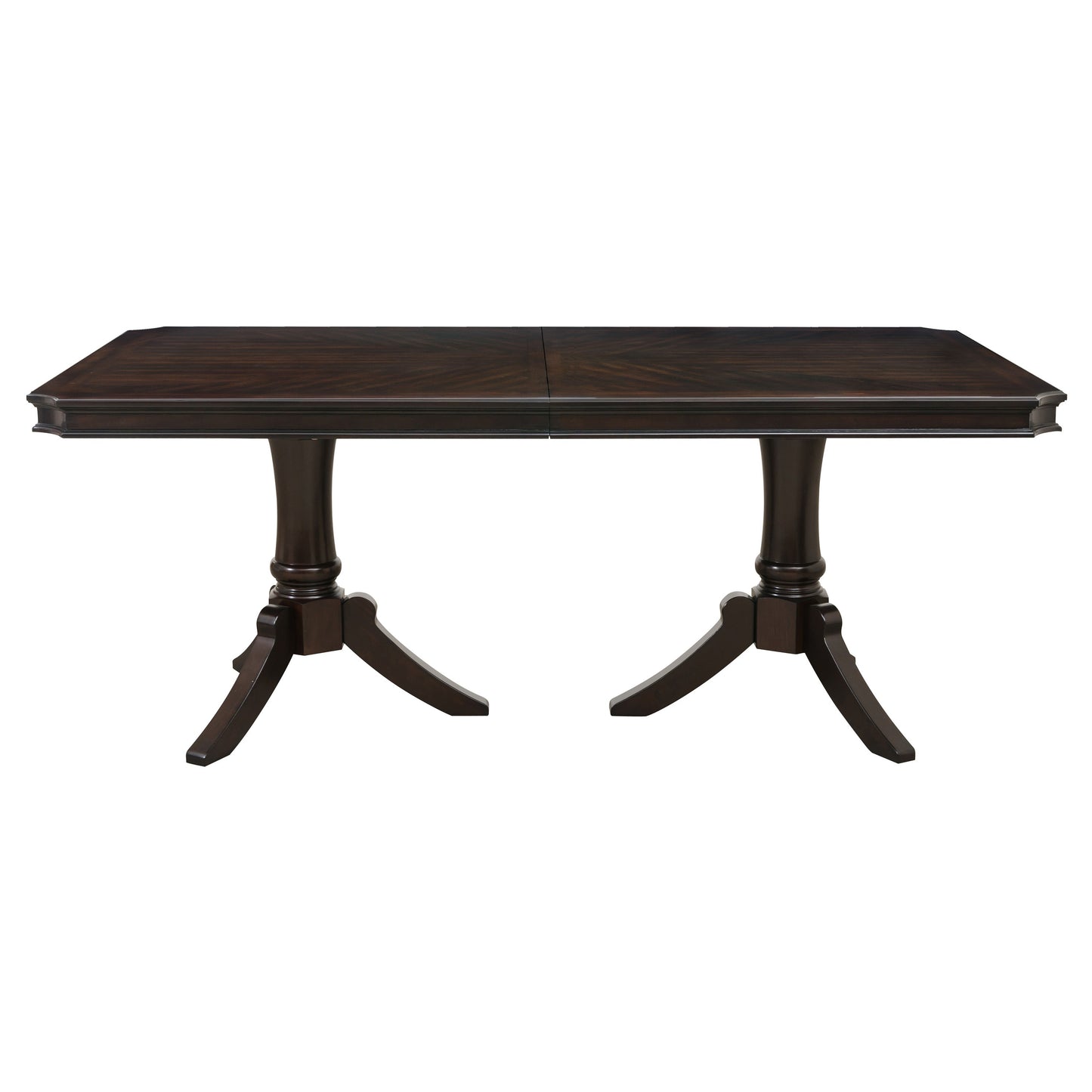 Dark brown expandable dining table with carved pedestal legs and inlaid wood veneer top