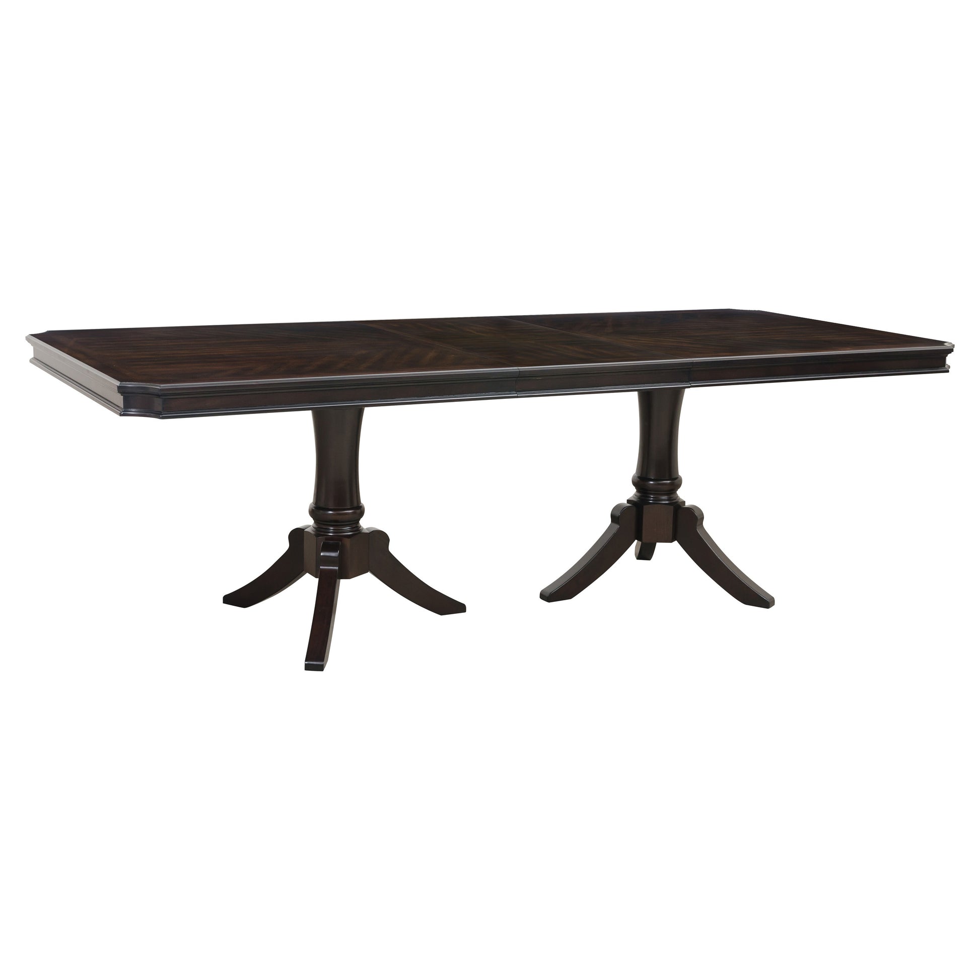 Dark wood dining table with carved pedestal legs and a detailed wood grain pattern