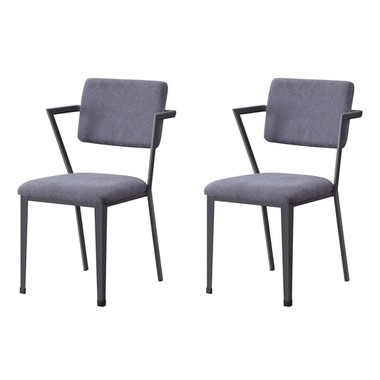 Two grey upholstered dining chairs with dark metal frames ideal for modern kitchens
