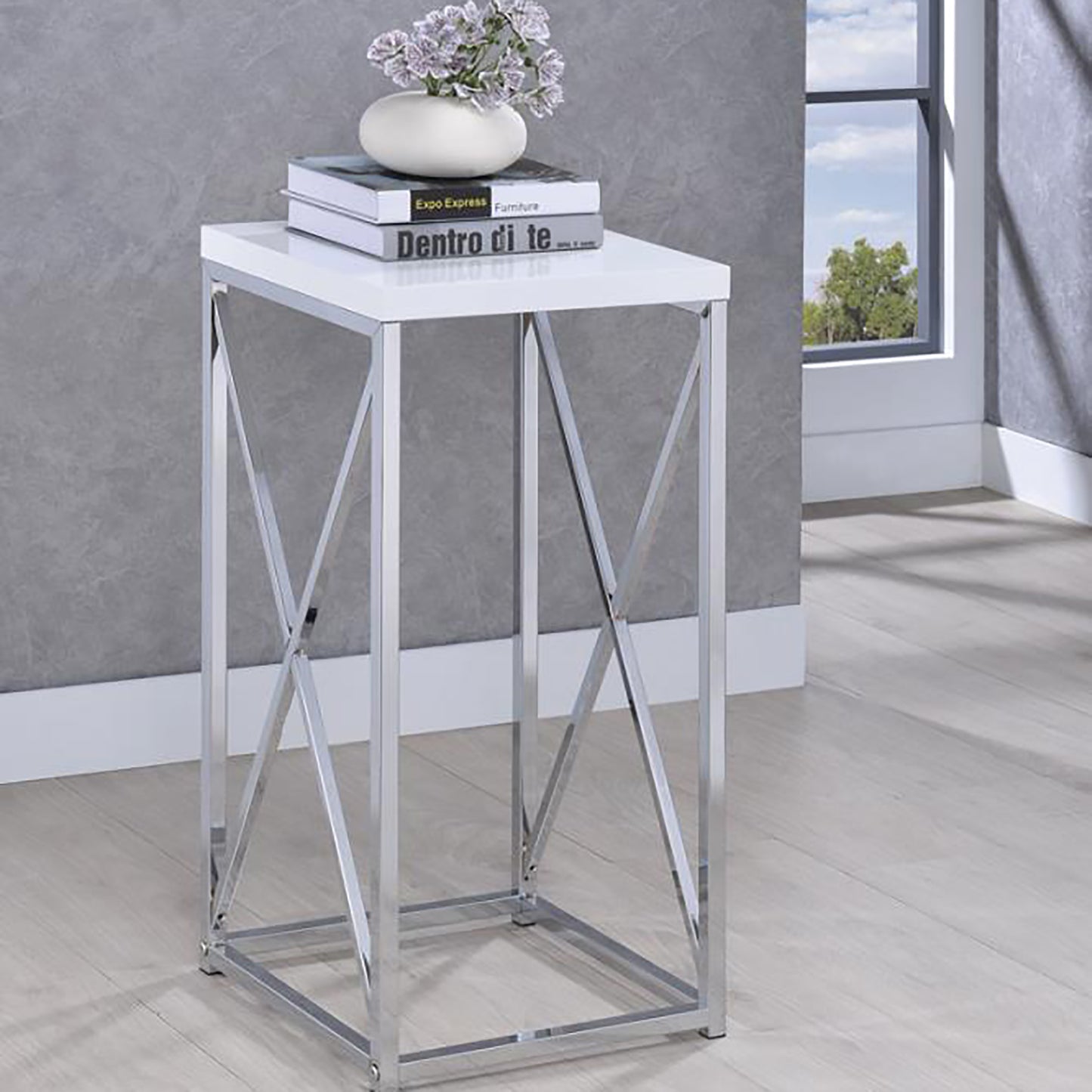 Glossy white top accent table with a chrome Xframe base