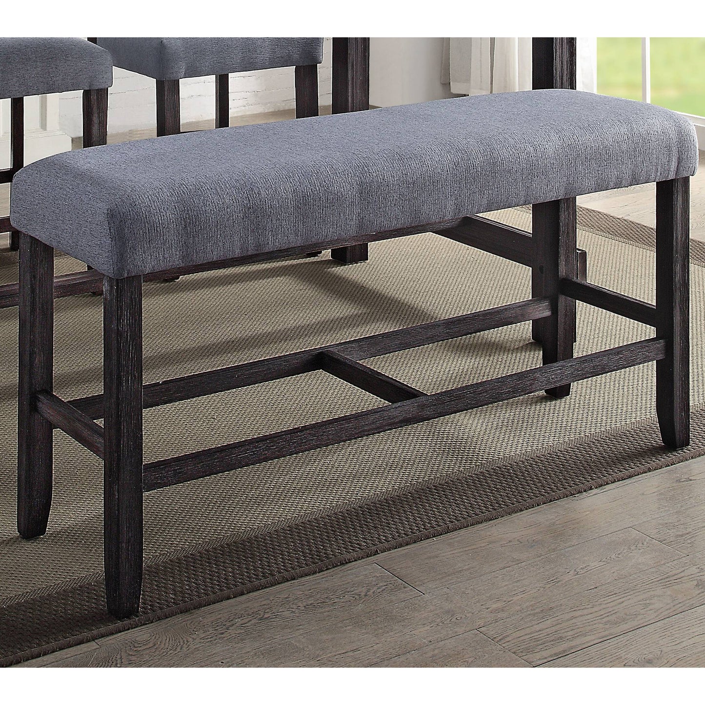 Modern grey upholstered dining bench with dark wood legs perfect for kitchen seating