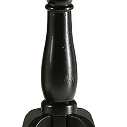 Black turned wood table leg with ornate detailing