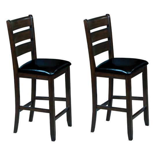 Two dark wood bar stools with black leather seats and slatted backs