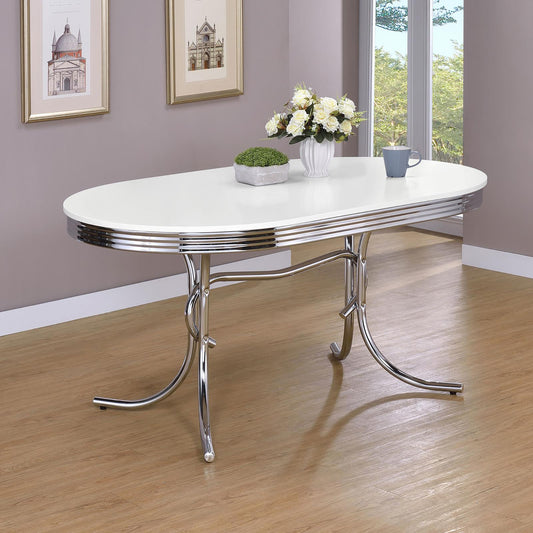 White oval dining table with chrome legs and accents ideal for breakfast nooks