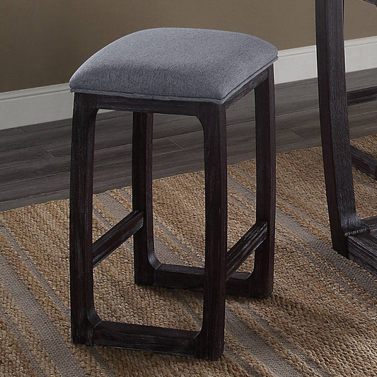 Gray upholstered counter stool with dark wood frame