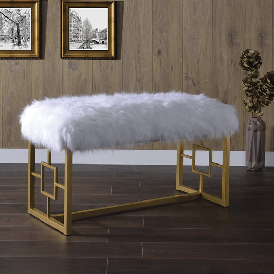 Plush white faux fur bench with gold geometric legs for modern seating