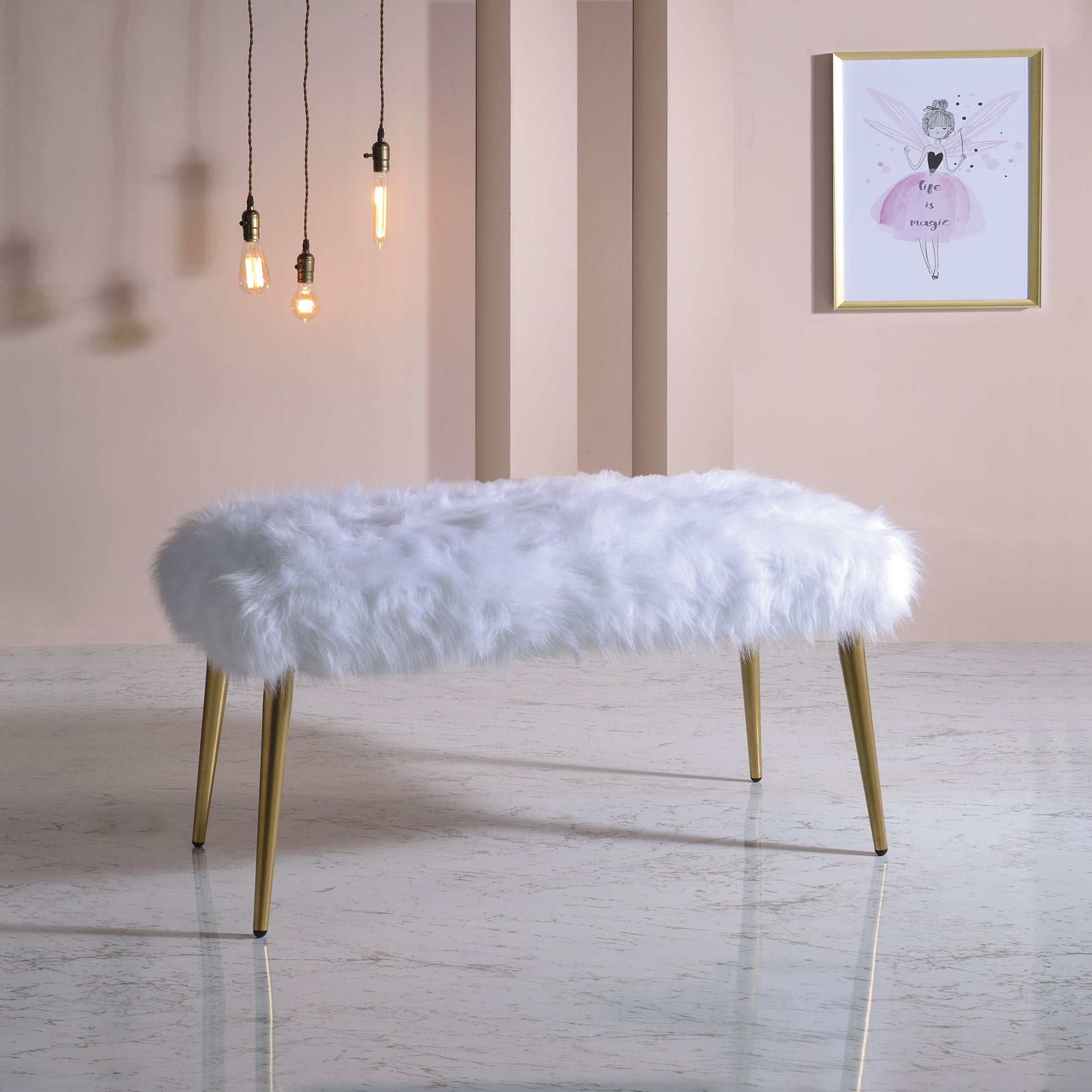 Fluffy white faux fur ottoman with elegant gold metal legs perfect for entryway decor