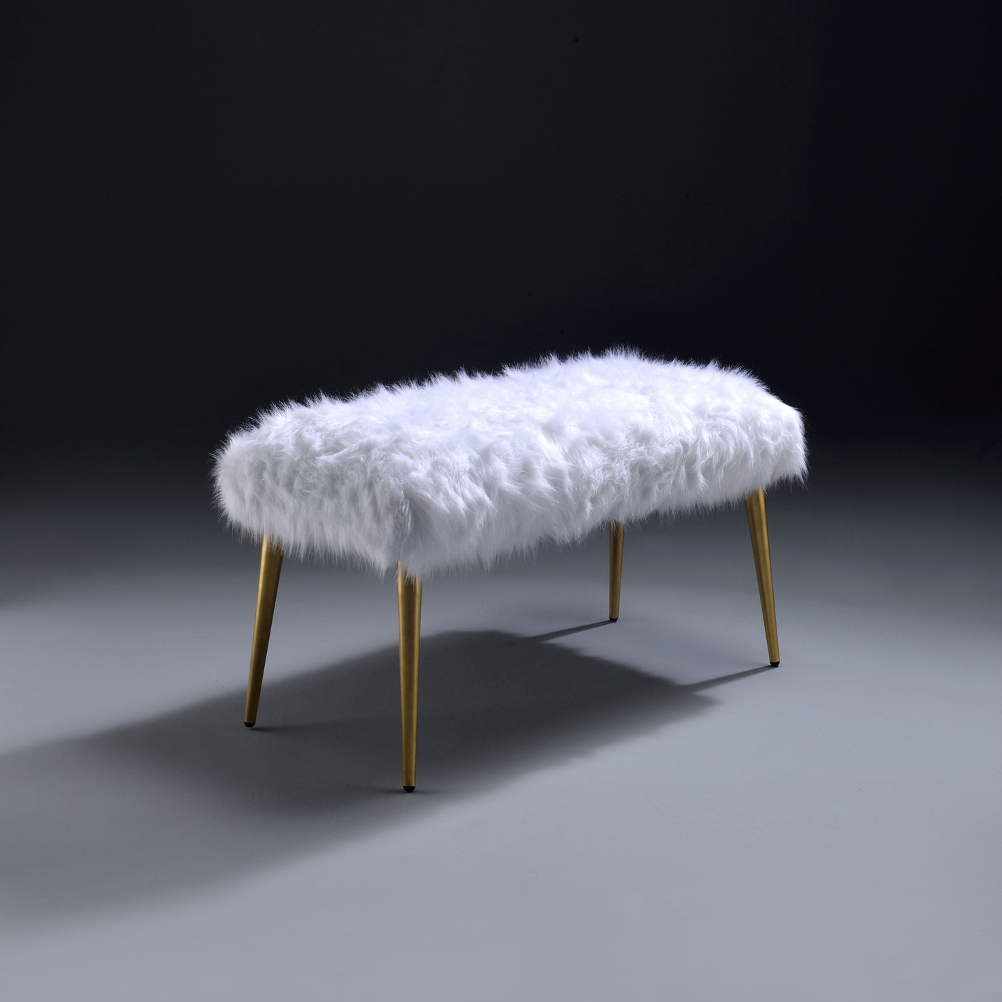 White faux fur ottoman with gold tapered legs modern accent seating