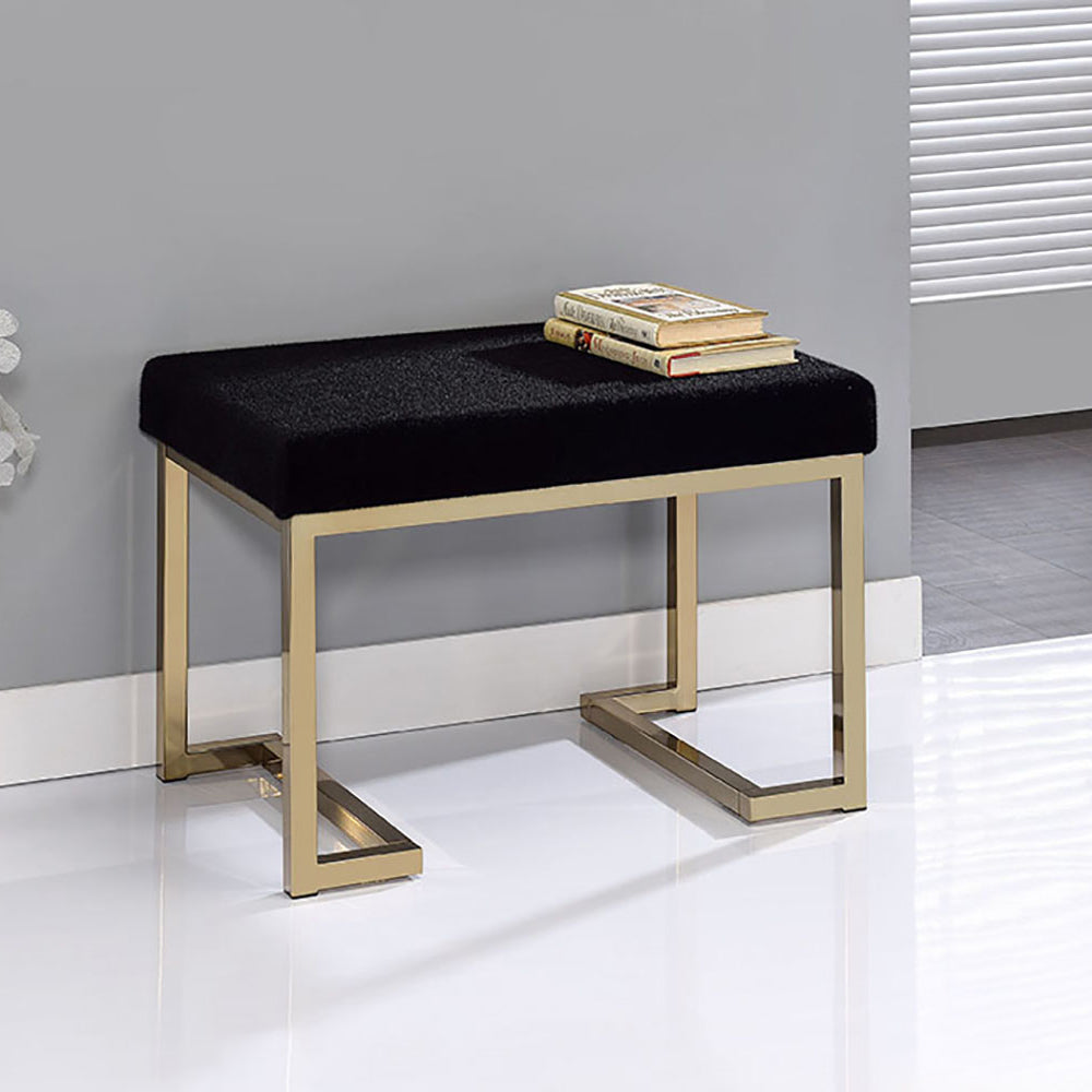 Black velvet upholstered bench with gold metal frame perfect for entryway seating