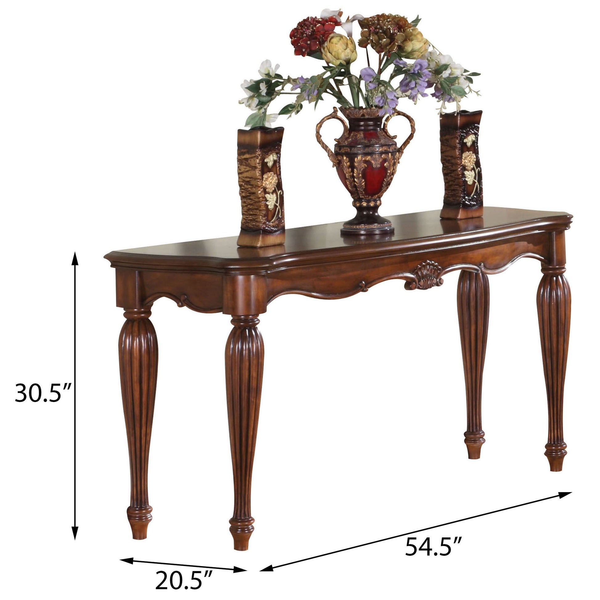 Ornate dark wood console table with carved details and decorative vases