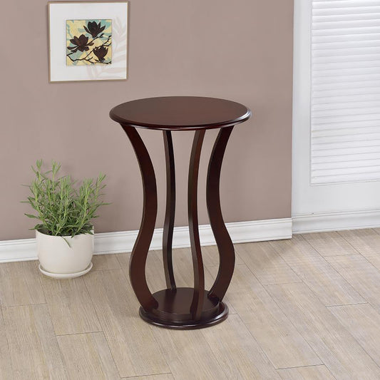 Dark brown wooden accent table with curved legs for a modern living room