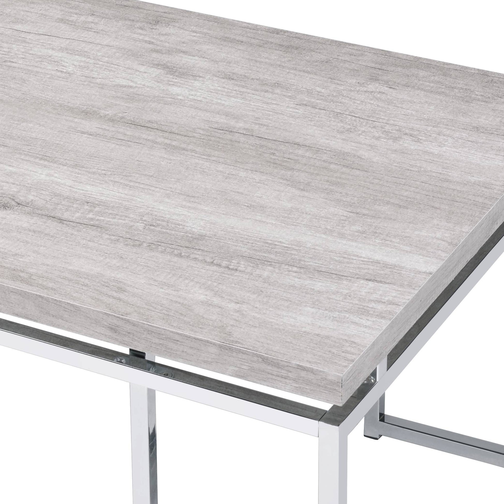 Modern grey wood grain coffee table with polished chrome legs sleek design