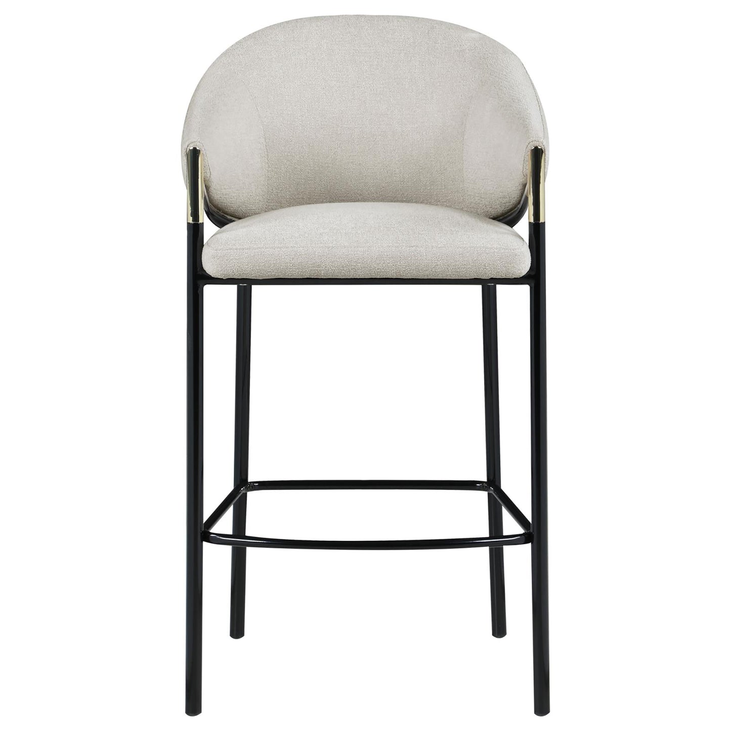 Light beige upholstered bar stool with curved back and black metal legs with gold accents
