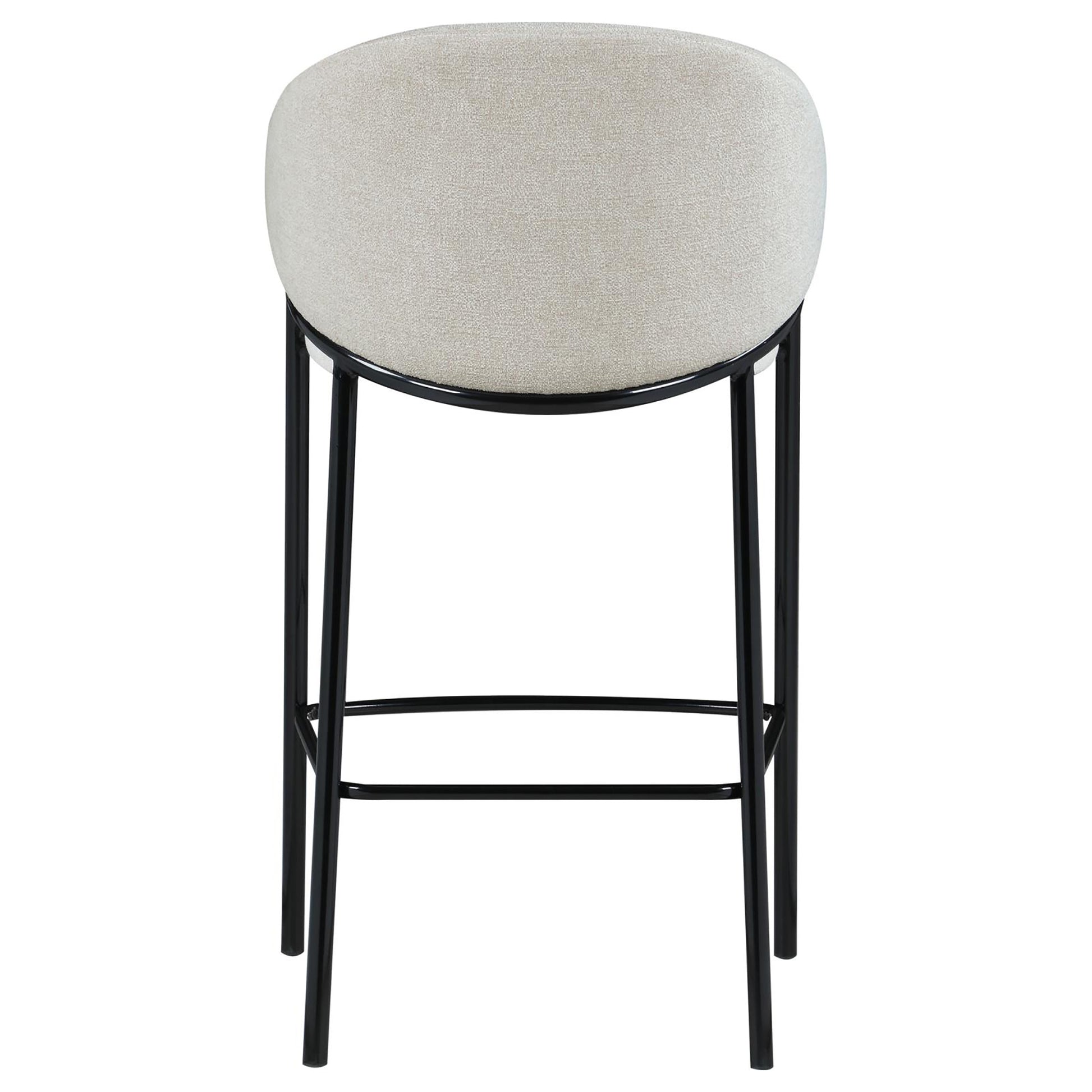 Modern bar stool with curved beige textured fabric seat and black metal frame