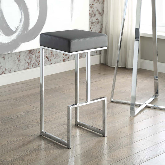 Contemporary grey faux leather bar stool with polished chrome frame