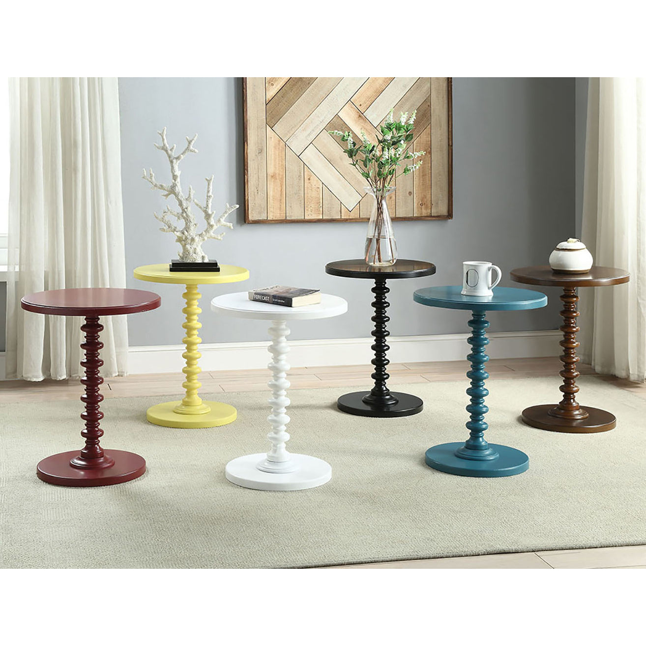 Red round accent table with beaded pedestal base