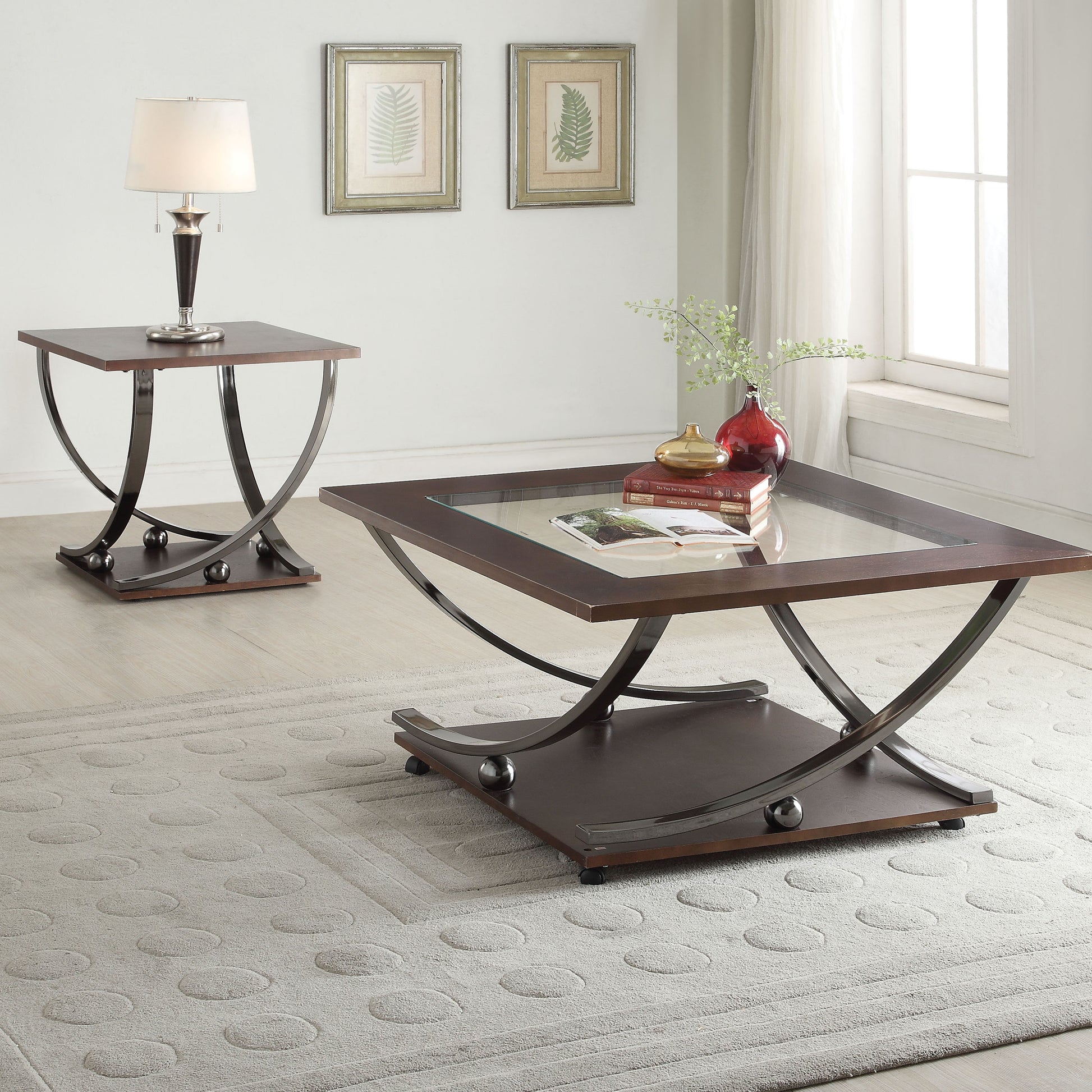 Modern dark wood coffee table with glass top and curved metal legs perfect for living rooms