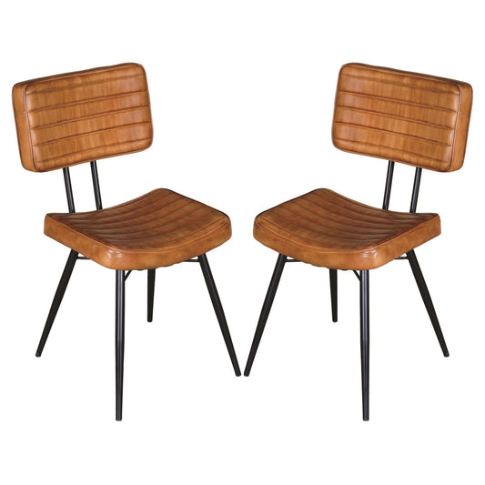 Two distressed brown faux leather dining chairs with quilted seats and backs black metal legs
