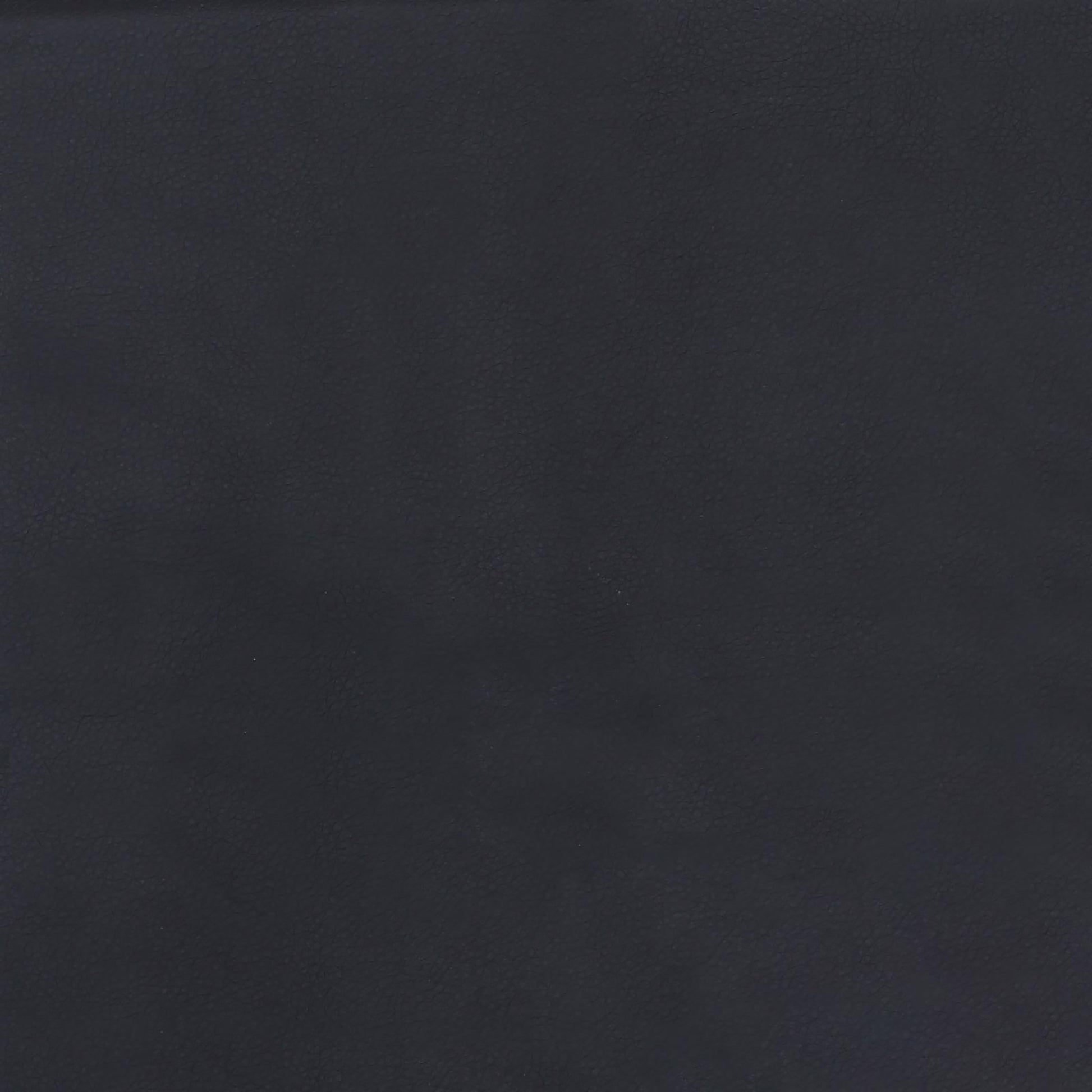 Dark navy textured leather swatch for upholstery applications