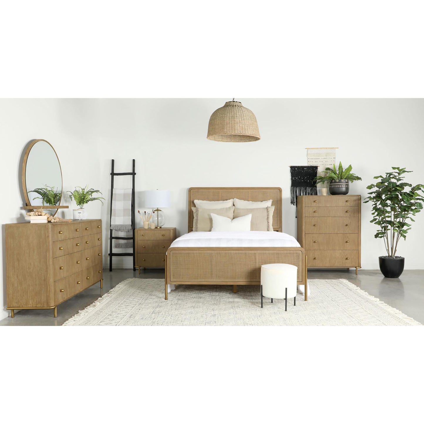 Rattan headboard bed frame with light beige bedding and pillows a natural wood dresser and nightstand