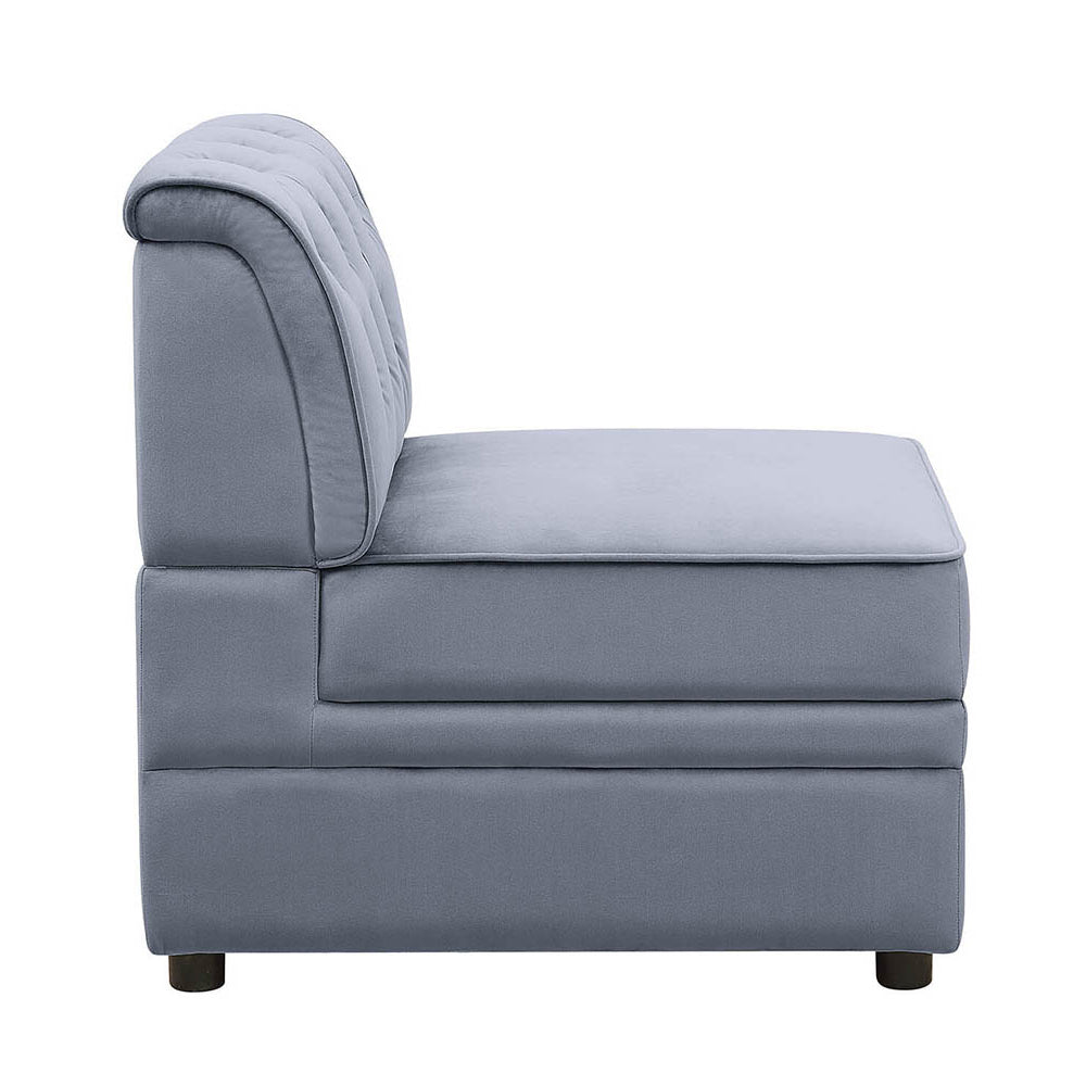 Gray velvet armless modular sofa section with tufted back and plush seating