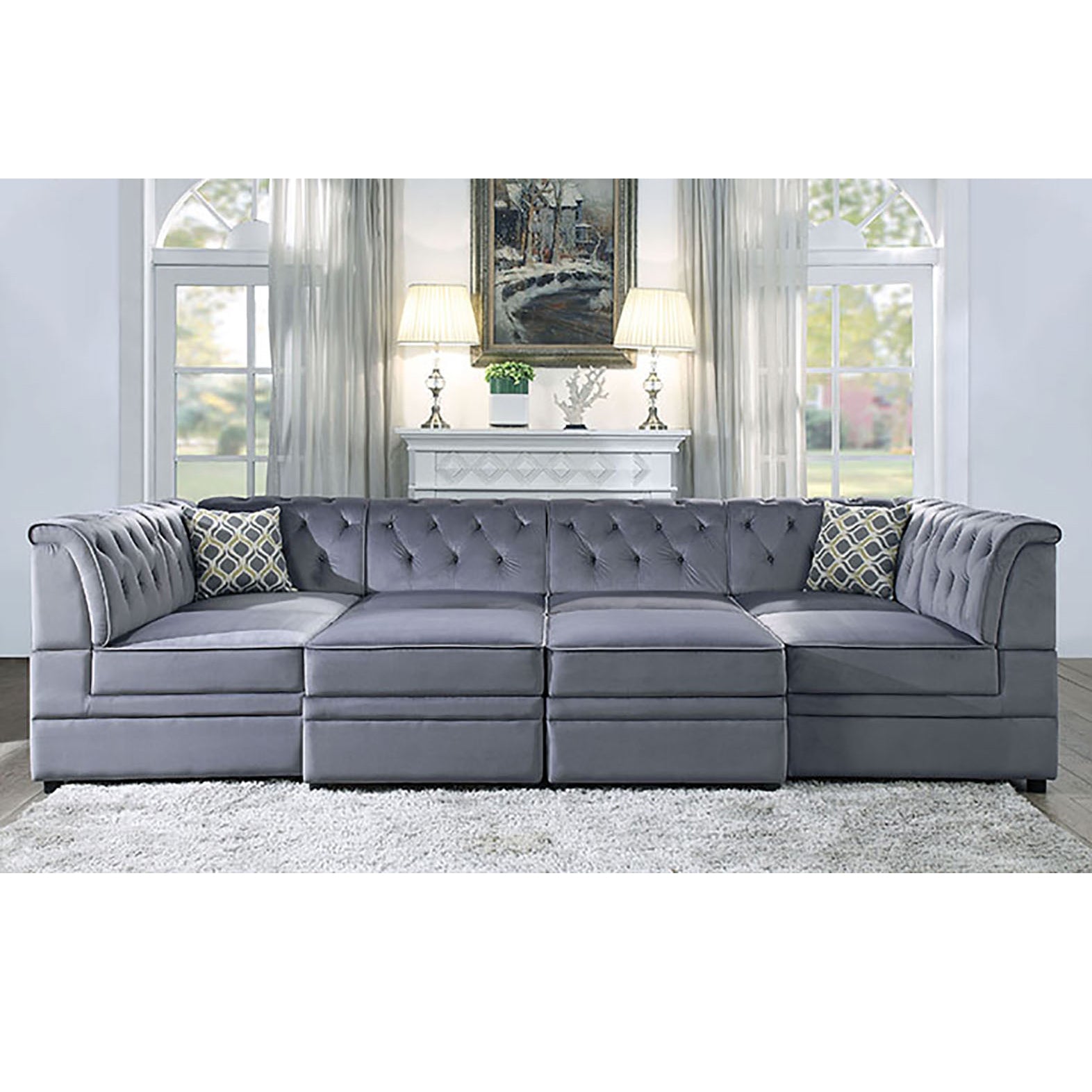 Gray velvet sectional sofa with tufted back and modern design