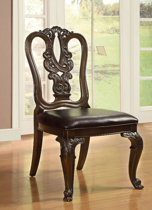 Ornate dark wood dining chair with padded leather seat featuring scrolling back details