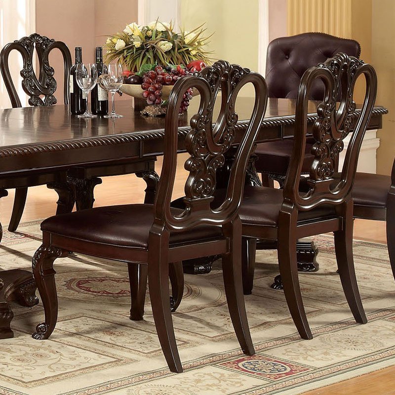 Dark brown ornate wood dining chairs with faux leather seats elegant classic design