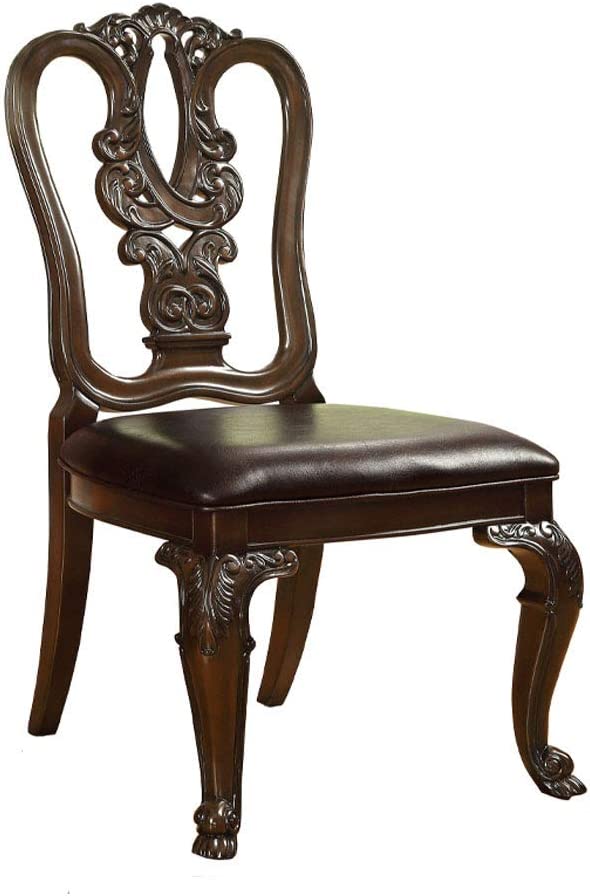 Dark brown carved wood armchair with leather seat suitable for elegant dining