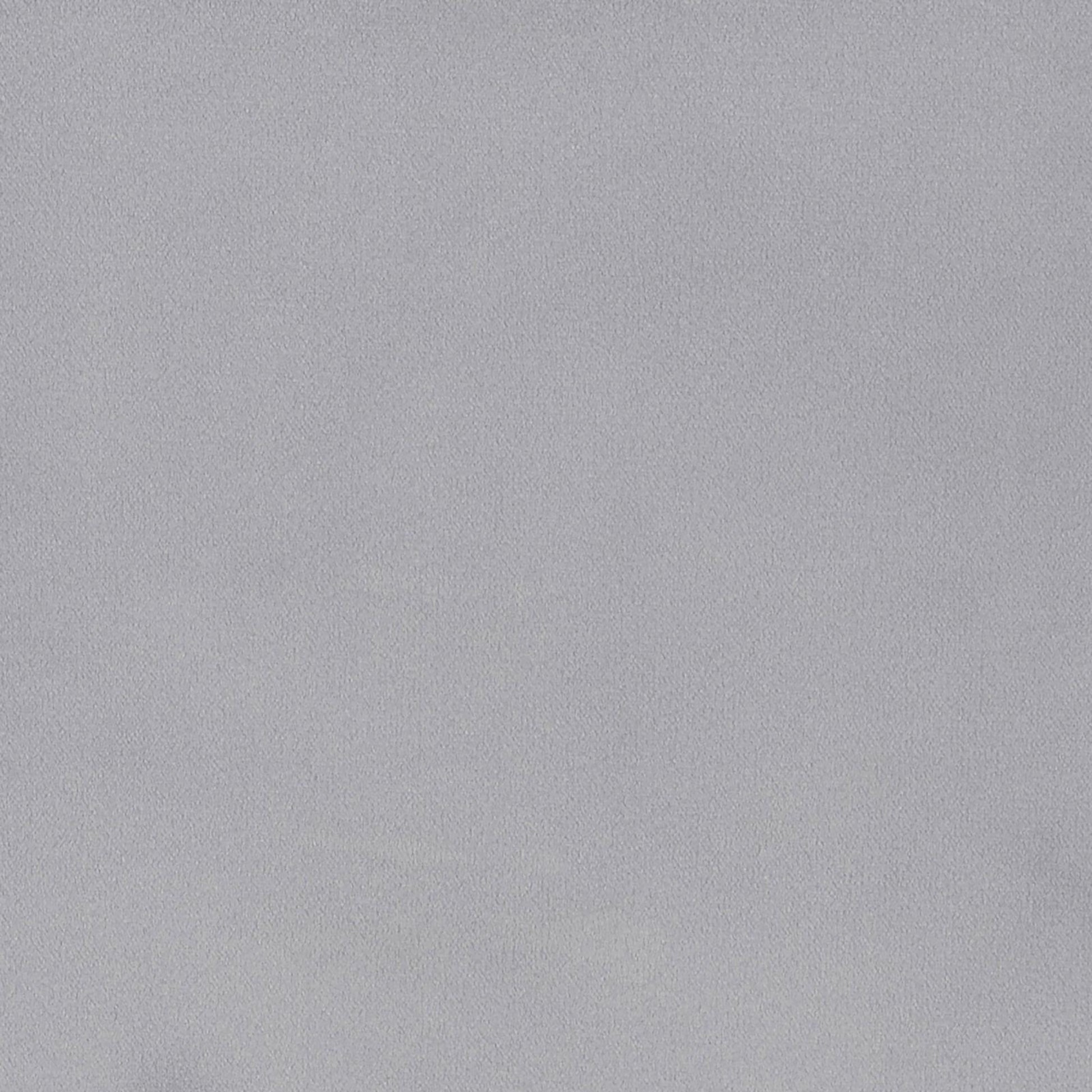 Closeup of smooth light grey textured fabric material